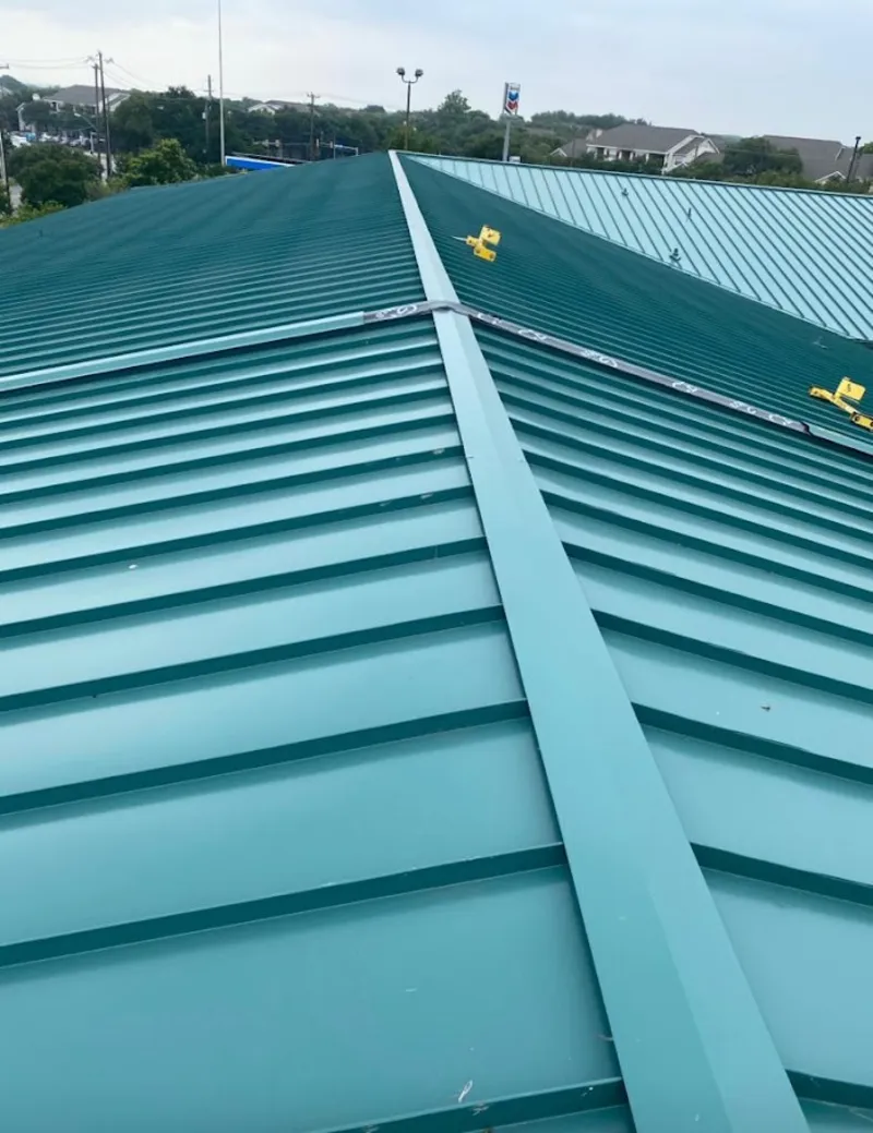 Green commercial metal roof ridge and valley for Metal Roof Repair in Willis